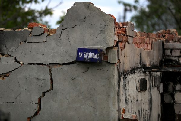 Photo: A street sign reading 'Kyiv street' is seen at a destroyed house, as Russia's attack on Ukraine continues, in Vilkhivka, Ukraine, May 25, 2022. Credit: REUTERS/Ivan Alvarado