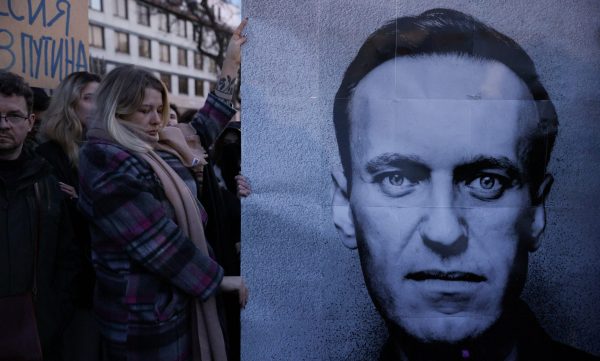 Photo: People gather outside the Russian embassy, following the death of Russian opposition leader Alexei Navalny, reported by prison authorities in Russia's Yamalo-Nenets region where he had been serving his sentence, in Warsaw, Poland, February 16, 2024. Credit: Dawid Zuchowicz/Agencja Wyborcza.pl via REUTERS