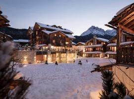 Post Alpina - Family Mountain Chalets, hotel di San Candido