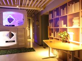 Wuhan Worry-free Capsule Hotel, hotel en Wuhan