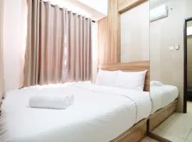 Minimalist 2BR Serpong Greenview Apartment By Travelio