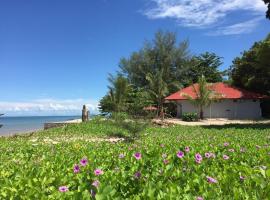 Red Coral Cottage, smeštaj u okviru domaćinstva u gradu Tanjung Rhu