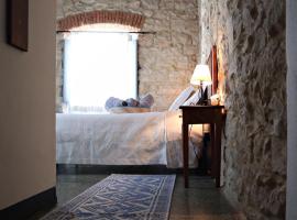 Drommire In Plassa E Clesia, hotel em Baunei