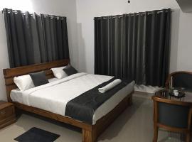 KK Group Of Residency, Virajpet,Coorg, hotell i Madikeri