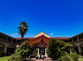 Vineyard Court Designer Suites Hotel, hotel em College Station