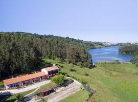 Apartamentos Rurales Las Garzas de Oyambre, отель в городе Сан-Висенте-де-ла-Баркера