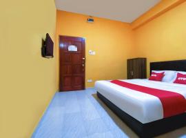 Super OYO 90039 Coop Hotel Kangar: Kangar şehrinde bir otel