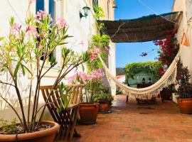 La Casa Flores, maison traditionnelle portugaise, hotel i Odeceixe