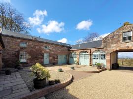 Loch Lomond Finnich Cottages, hotel amb jacuzzi a Drymen