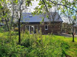 Le chalet des Oisaï โรงแรมในWibrin