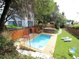 Apartamento 2 dormitorios con piscina y jardín