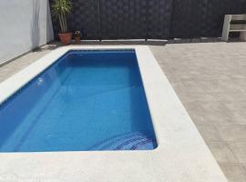 Apartamentos NayDa Gran casa con piscina, отель в Мериде