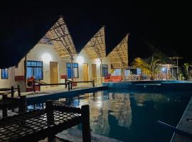 Mkeka Spice Lodge Jambiani، كوخ في جامبياني