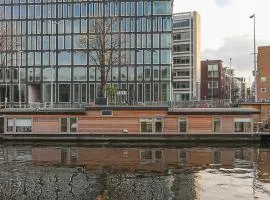 HouseBoat next to AMSTEL