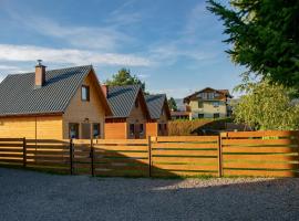 Domki nad jeziorem, lodge en Zarzecze