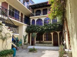 Kasa Kiwi Hostel & Travel Agency, מלון בקצאלטננגו