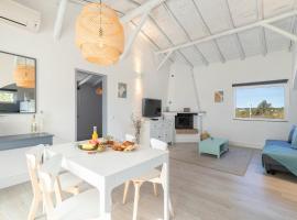 Palmeiras Cottages, loc de glamping din Mexilhoeira Grande