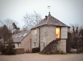 Witney में, होटल High Cogges Farm Holiday Cottages - The Granary