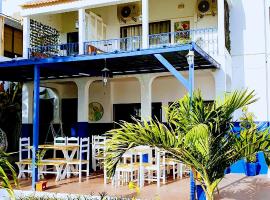 Kelly Guest House, hotel em Praia