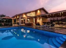 StayVista's Villa 123 At Canary Farms - Mountain-View Luxury Mansion with Infinity Pool, Jacuzzi & Games Zone