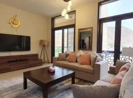 ONE Elegant 1BHK Apartment in Muscat Bay 02