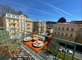 Balconies above colonnade apartments, Hotel in Marienbad