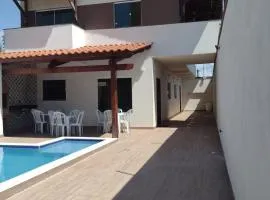 Praia Enseada dos Corais - casa com piscina -Pos Beira mar - 4 Quartos