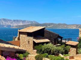 SAN TEODORO PUNTA EST AMPIO TRILOCALE VISTA MARe, hotel u gradu Kapo Koda Kavalo