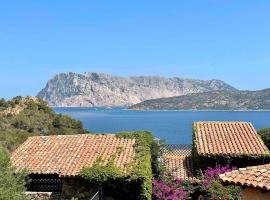 SAN TEODORO PUNTA EST TRILOCALE VISTA MARE, hotel u gradu Kapo Koda Kavalo