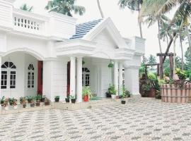 Jinan palace guest house Jinan palace guest house, hotelli kohteessa Nedumbassery