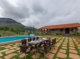 StayVista's Ficus Farms - Mountain-View Haven with Rustic Artsy Interiors, Outdoor Pool, Glasshouse, Home Theatre & Karaoke Delight