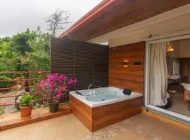 StayVista's Beyond The Blue Door - Valley-View Villa with Outdoor Jacuzzi & Massage Chair