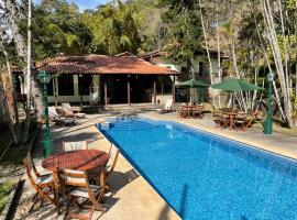 Pousada Cozy House, hotel pet friendly a Itaipava