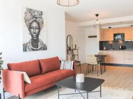 African-Style Apartment - stadtnah, Parkplatz, E-Ladestation für Auto & Fahrräder, Gitterbox für Fahrräder, Fitnessstudio