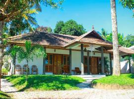 Green Court Cottages, budgethotell i Thekkady