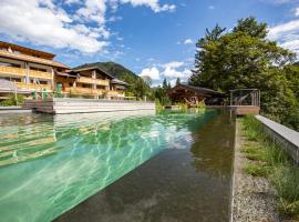 Brunnenhof Oberstdorf - Ferienwohnungen mit Hotel Service، فندق سبا في اوبرستدورف