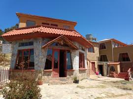 Hosteria LAS ISLAS, δωμάτιο σε οικογενειακή κατοικία σε Comunidad Yumani