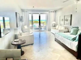 Private Poolside, Loft-Like Condo with Panoramic Grace Bay Views, Walk to Beach, Restaurants, & Turtle Cove Marina!