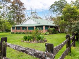 Tatbern Park Cottage Wallalong, фермерський будинок у місті Wallalong