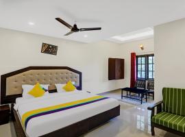 Itsy Hotels Regalia Grand, 500 Mtrs From Madikeri Fort, hotelli kohteessa Madikeri