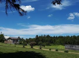 Rustico Acres Cottages, casa de muntanya a North Rustico