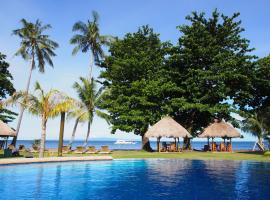 Pura Vida Beach & Dive Resort, hotel in Dauin