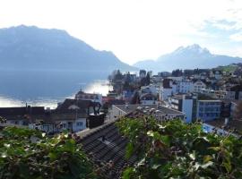 Wohnung mit herrlichem Blick auf den Pilatus, hotel in Weggis