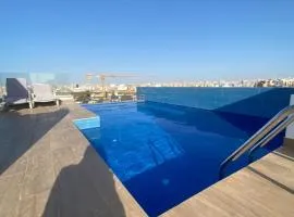 Magnifique Appartement avec PISCINE sur le toit, 3 Chambres, 4 Salles de Bain, Salle de Gym et Terrasse, LUXE ET COMFORT aux ALMADIES