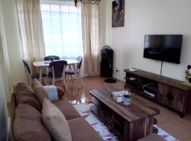 Tranquil haven - spacious, cozy, 1 bedroom, hotel s parkiralištem u gradu 'Kisumu'