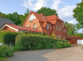 Moderne Ferienwohnung mit Kamin u Garten im EG 100qm Nähe Weser und Golfplatz – hotel w mieście Achim