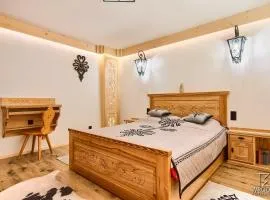 Apartament Zakopane utrzymany w stylu góralskiej chaty