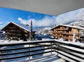 Triplex in Villars Centre with Parking