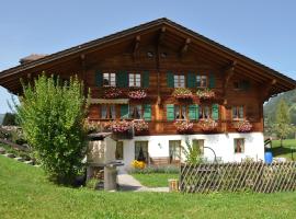 Alpenchalet Spiher Gstaad Ferienwohnung im Parterre, pigus viešbutis mieste Gštadas