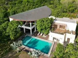 The Leaf by StayVista - An enchanting escape offering a pool, terrace, lush lawn, contemporary interiors, and indoor games